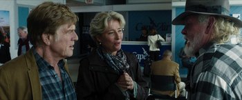Movie still from “A Walk in the Woods” (2015), directed by Ken Kwapis – A woman in a brown jacket is talking to another woman; Medium shot, Over the shoulder angle