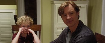 Movie still from “A Walk in the Woods” (2015), directed by Ken Kwapis – A man sitting in front of another man in front of a table; Close Up shot, Over the shoulder angle