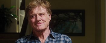 Movie still from “A Walk in the Woods” (2015), directed by Ken Kwapis – An older man with blonde hair and a blue plaid shirt; Close Up shot, Over the shoulder angle