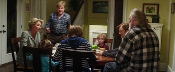 Movie still from “A Walk in the Woods” (2015), directed by Ken Kwapis – A group of people sitting at a table with food; Medium shot, Over the shoulder angle