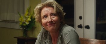 A person with short blonde hair