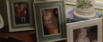 Movie still from “A Walk in the Woods” (2015), directed by Ken Kwapis – A picture frame with a picture of a woman in it; Extreme Close Up shot, High angle