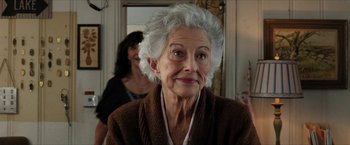Movie still from “A Walk in the Woods” (2015), directed by Ken Kwapis – An older woman with a white hair and a brown sweater; Close Up shot, Over the shoulder angle