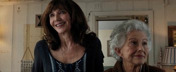 Movie still from “A Walk in the Woods” (2015), directed by Ken Kwapis – A woman standing next to an older woman in a room; Close Up shot, Low angle