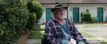 Movie still from “A Walk in the Woods” (2015), directed by Ken Kwapis – An older man with a beard wearing a hat; Medium shot, Low angle