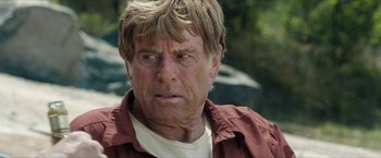 Movie still from “A Walk in the Woods” (2015), directed by Ken Kwapis – An older man wearing a brown shirt and a white shirt; Close Up shot, Over the shoulder angle