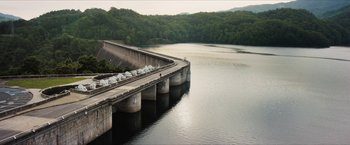 Movie still from “A Walk in the Woods” (2015), directed by Ken Kwapis – A bridge that is going over a body of water; Extreme Wide shot, High angle