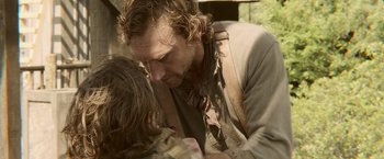 Movie still from “Abraham Lincoln: Vampire Hunter” (2012), directed by Timur Bekmambetov – A person kissing a person on the cheek; Close Up shot, Over the shoulder angle