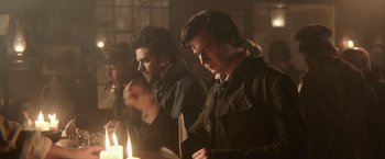 Movie still from “Abraham Lincoln: Vampire Hunter” (2012), directed by Timur Bekmambetov – A couple of men standing next to each other in a room; Medium shot, Over the shoulder angle