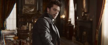 Movie still from “Abraham Lincoln: Vampire Hunter” (2012), directed by Timur Bekmambetov – A person wearing a suit and tie; Close Up shot, Over the shoulder angle