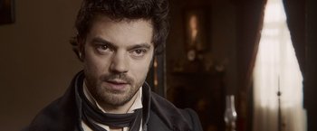 Movie still from “Abraham Lincoln: Vampire Hunter” (2012), directed by Timur Bekmambetov – A person wearing a suit and tie; Close Up shot, Over the shoulder angle