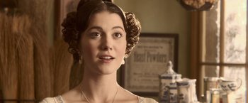 Movie still from “Abraham Lincoln: Vampire Hunter” (2012), directed by Timur Bekmambetov – A young woman in a period dress looking at the camera; Close Up shot, Over the shoulder angle