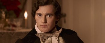 Movie still from “Abraham Lincoln: Vampire Hunter” (2012), directed by Timur Bekmambetov – A person wearing a bow tie; Close Up shot, Over the shoulder angle