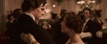 Movie still from “Abraham Lincoln: Vampire Hunter” (2012), directed by Timur Bekmambetov – A man and a woman in formal wear at a party; Close Up shot, Over the shoulder angle