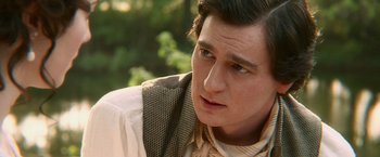 Movie still from “Abraham Lincoln: Vampire Hunter” (2012), directed by Timur Bekmambetov – A person wearing a suit and tie; Close Up shot, Over the shoulder angle