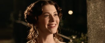 Movie still from “Abraham Lincoln: Vampire Hunter” (2012), directed by Timur Bekmambetov – A person with curly hair smiling; Close Up shot, Over the shoulder angle