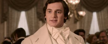 Movie still from “Abraham Lincoln: Vampire Hunter” (2012), directed by Timur Bekmambetov – A person wearing a suit and bow tie; Close Up shot, Low angle