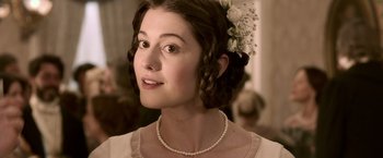 Movie still from “Abraham Lincoln: Vampire Hunter” (2012), directed by Timur Bekmambetov – A young woman with a flower in her hair; Close Up shot, Over the shoulder angle
