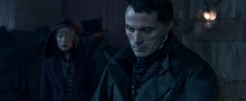 Movie still from “Abraham Lincoln: Vampire Hunter” (2012), directed by Timur Bekmambetov – A person wearing a coat; Close Up shot, Over the shoulder angle