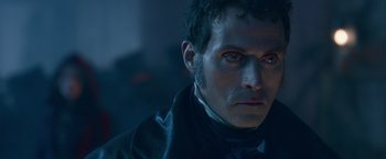 Movie still from “Abraham Lincoln: Vampire Hunter” (2012), directed by Timur Bekmambetov – A person wearing a suit and tie; Close Up shot, Over the shoulder angle