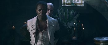 Movie still from “Abraham Lincoln: Vampire Hunter” (2012), directed by Timur Bekmambetov – A man in a white jacket and a man in a black jacket; Medium shot, Over the shoulder angle