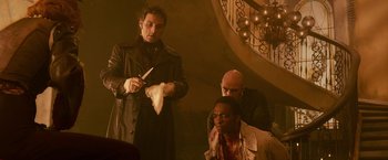 Movie still from “Abraham Lincoln: Vampire Hunter” (2012), directed by Timur Bekmambetov – A group of men standing next to each other in a room; Medium shot, High angle