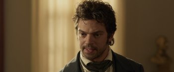 Movie still from “Abraham Lincoln: Vampire Hunter” (2012), directed by Timur Bekmambetov – A person wearing a suit and tie; Close Up shot, Over the shoulder angle