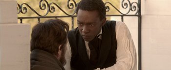 Movie still from “Abraham Lincoln: Vampire Hunter” (2012), directed by Timur Bekmambetov – A man in a vest and tie talking to another man in a vest and tie; Close Up shot, Over the shoulder angle