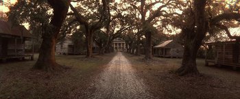 Movie still from “Abraham Lincoln: Vampire Hunter” (2012), directed by Timur Bekmambetov – A dirt road going through a wooded area; Extreme Wide shot, High angle