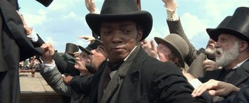Movie still from “Abraham Lincoln: Vampire Hunter” (2012), directed by Timur Bekmambetov – A group of men wearing hats and ties; Close Up shot, Low angle