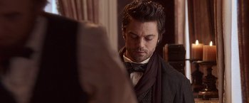 Movie still from “Abraham Lincoln: Vampire Hunter” (2012), directed by Timur Bekmambetov – A person wearing a suit and tie; Close Up shot, Over the shoulder angle