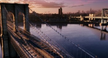 Movie still from “Adventureland” (2009), directed by Greg Mottola – A view of a city from across the river; Extreme Wide shot, High angle