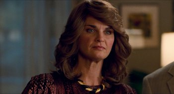 Movie still from “Adventureland” (2009), directed by Greg Mottola – A person with long hair; Close Up shot, Over the shoulder angle