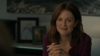 Movie still from “After the Wedding” (2019), directed by Bart Freundlich – Julianne moore in a still from the movie still alice; Medium shot, Over the shoulder angle
