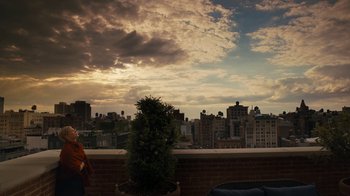 Movie still from “After the Wedding” (2019), directed by Bart Freundlich – A view of a city skyline from a balcony; Extreme Wide shot, High angle