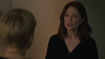 Movie still from “After the Wedding” (2019), directed by Bart Freundlich – A woman in a black shirt talking to another woman; Close Up shot, Over the shoulder angle