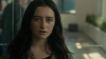 Movie still from “After the Wedding” (2019), directed by Bart Freundlich – A person with long black hair; Close Up shot, Over the shoulder angle