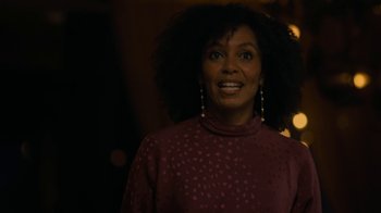 Movie still from “After the Wedding” (2019), directed by Bart Freundlich – A person wearing a red shirt; Close Up shot, Over the shoulder angle