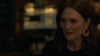 Movie still from “After the Wedding” (2019), directed by Bart Freundlich – A person with long hair; Close Up shot, Over the shoulder angle