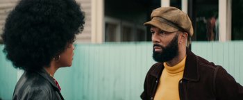 Movie still from “Alice” (2022), directed by Krystin Ver Linden – A man with a beard talking to a woman; Close Up shot, Over the shoulder angle