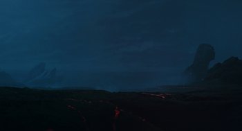 Movie still from “Aliens” (1986), directed by James Cameron – A view of a dark sky at night with red lights; Extreme Wide shot, Low angle