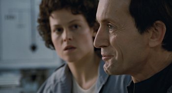 Movie still from “Aliens” (1986), directed by James Cameron – A man and a woman looking at each other; Close Up shot, Over the shoulder angle