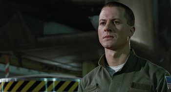 Movie still from “Aliens” (1986), directed by James Cameron – A person wearing a jacket; Close Up shot, Low angle