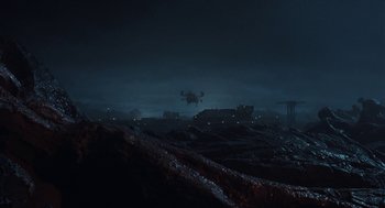 Movie still from “Aliens” (1986), directed by James Cameron – An image of a night scene with a helicopter flying in the sky; Extreme Wide shot, Low angle