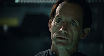 Movie still from “Aliens” (1986), directed by James Cameron – A person looking up at the sky; Close Up shot, Over the shoulder angle