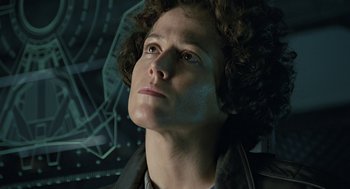 Movie still from “Aliens” (1986), directed by James Cameron – A man with curly brown hair is looking up; Close Up shot, Low angle