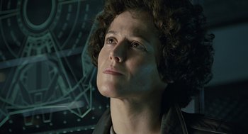 Movie still from “Aliens” (1986), directed by James Cameron – A person looking up at something; Close Up shot, Low angle