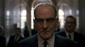 Movie still from “All the Way” (2016), directed by Jay Roach – An older man wearing a suit and tie; Close Up shot, Low angle