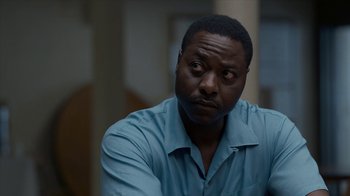 Movie still from “All the Way” (2016), directed by Jay Roach – A man in a blue shirt is looking at the camera; Close Up shot, Over the shoulder angle