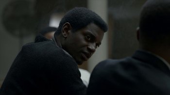 Movie still from “All the Way” (2016), directed by Jay Roach – A person sitting down; Close Up shot, Over the shoulder angle